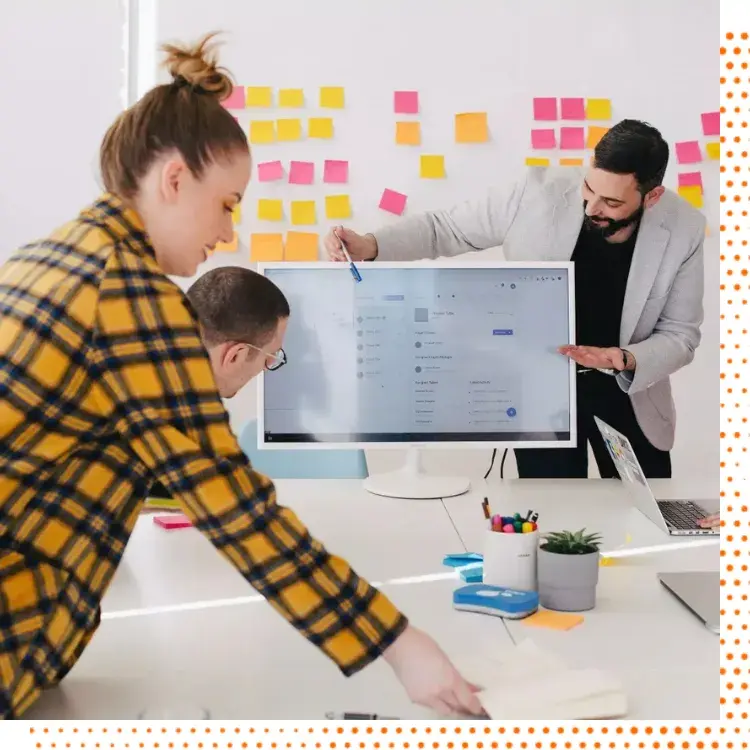 A team working on applying customer retention strategies powered by RUSH.